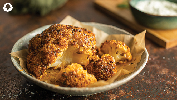 Whole Roasted Cauliflower with Herb Sauce